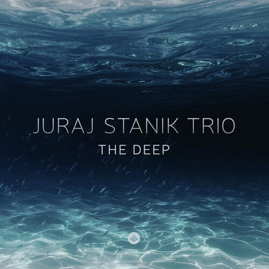 Stanik, Juraj: The Deep (Vinyl LP). The Deep' - brings a surprise. It's mostly about the tone of a number of the ballads on it, adding something romantic to his approach, with a gratifying affinity for melody that still feels safe in his own very personal interpretation. And always with that swing. Intelligent but never intellectual, with no pretentious pathos and none of that 'you just gotta listen to this!' feel. In a nutshell, pure.. 