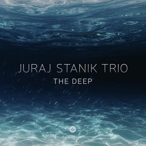 Stanik, Juraj: The Deep (Vinyl LP). The Deep' - brings a surprise. It's mostly about the tone of a number of the ballads on it, adding something romantic to his approach, with a gratifying affinity for melody that still feels safe in his own very personal interpretation. And always with that swing. Intelligent but never intellectual, with no pretentious pathos and none of that 'you just gotta listen to this!' feel. In a nutshell, pure.. 